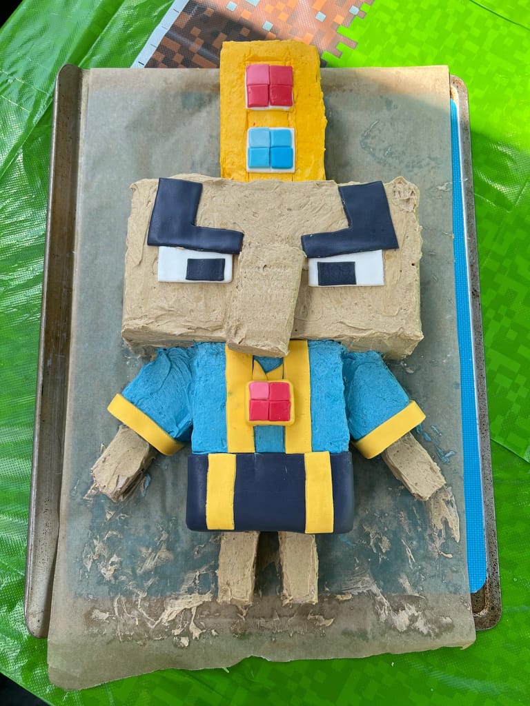 Finished Arch Illager cake decorated with fondant details.